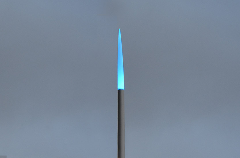 Illuminated Pole Top at Night